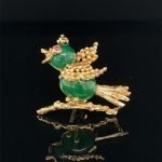 Green stone bird brooch